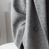 Manteau long en laine à double boutonnage pour femme