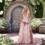 Robe longue à fleurs col licou pour femme