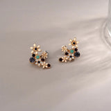 Boucles d'oreilles fleur femme double superposition