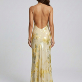 Robe Longue Satinée Fleurie Dos Nu Élégance Luxe