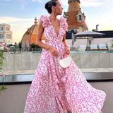 Robe longue fleurie à col V et volants