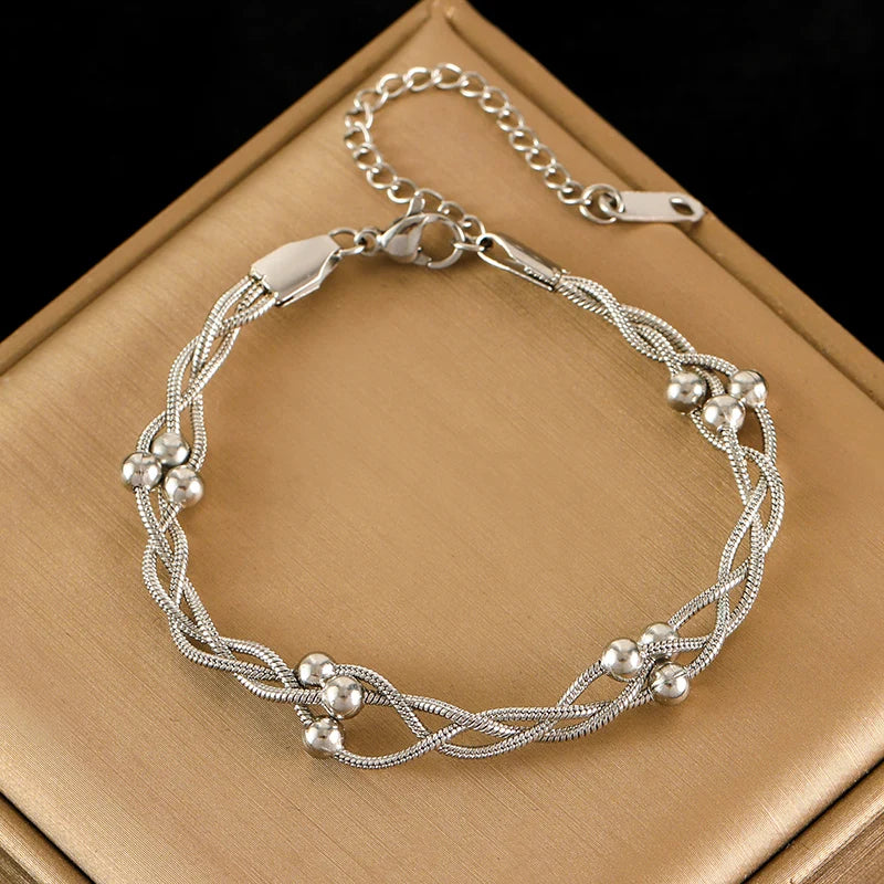 Bracelet femme tressé en acier inoxydable ajustable