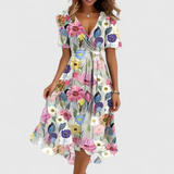 Robe midi portefeuille fleurie à manches volantées