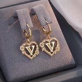 Boucles d'oreilles créoles cœur avec initiale, femme