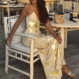 Robe Longue Satinée Fleurie Dos Nu Élégance Luxe