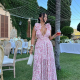 Robe longue fleurie à col V et volants
