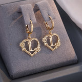 Boucles d'oreilles créoles cœur avec initiale, femme