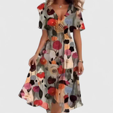 Robe midi portefeuille fleurie à manches volantées