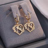 Boucles d'oreilles créoles cœur avec initiale, femme