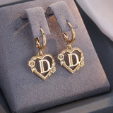 Boucles d'oreilles créoles cœur avec initiale, femme