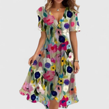 Robe midi portefeuille fleurie à manches volantées