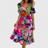 Robe midi portefeuille fleurie à manches volantées