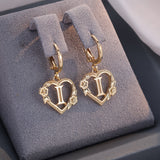 Boucles d'oreilles créoles cœur avec initiale, femme