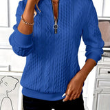 Pull femme torsadé à col zippé