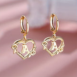 Boucles d'oreilles créoles cœur avec initiale, femme