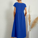 Robe Midi Unie à Col Rond