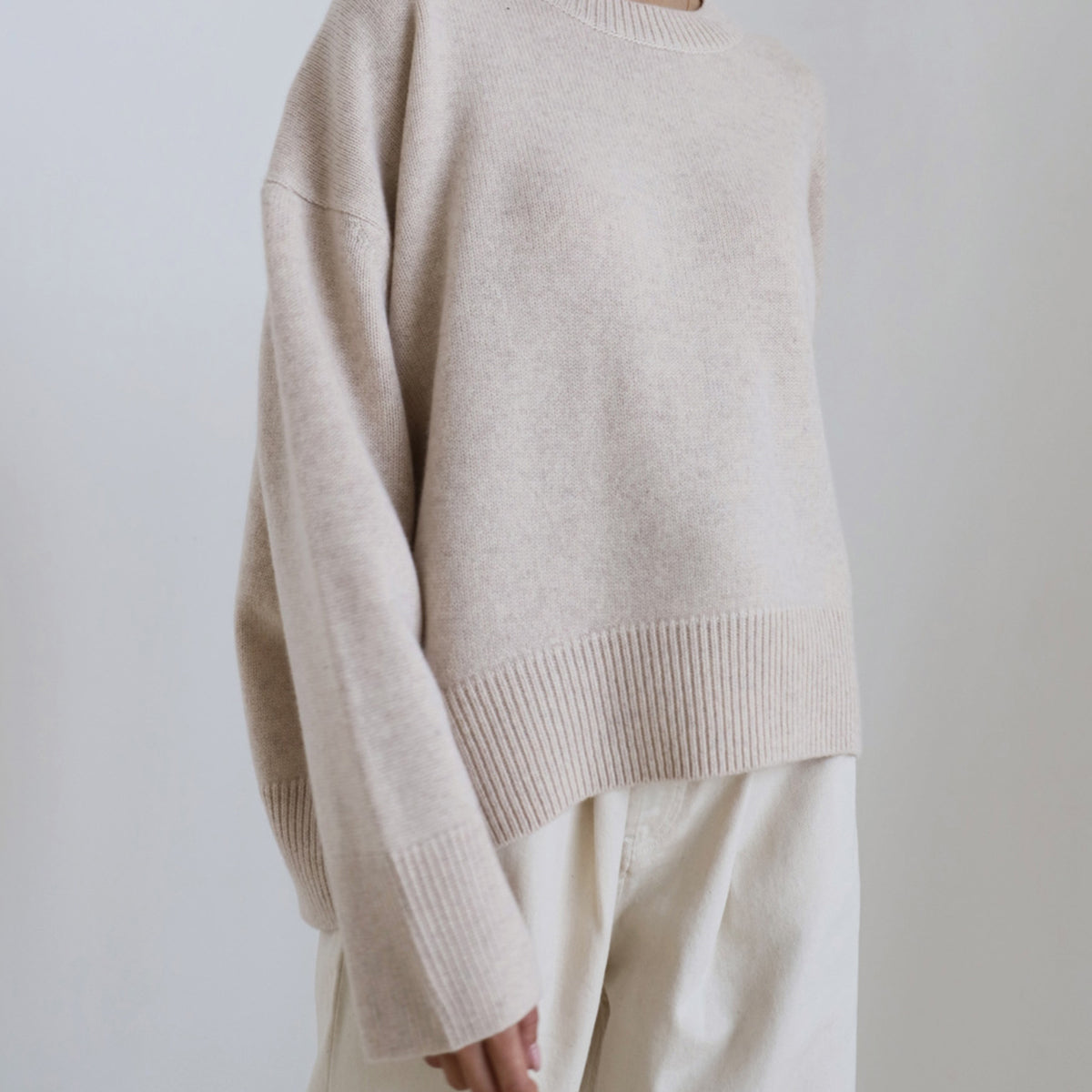 Pull oversize femme col rond à bords côtelés