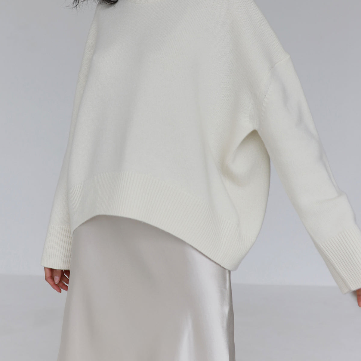 Pull oversize femme col rond à bords côtelés