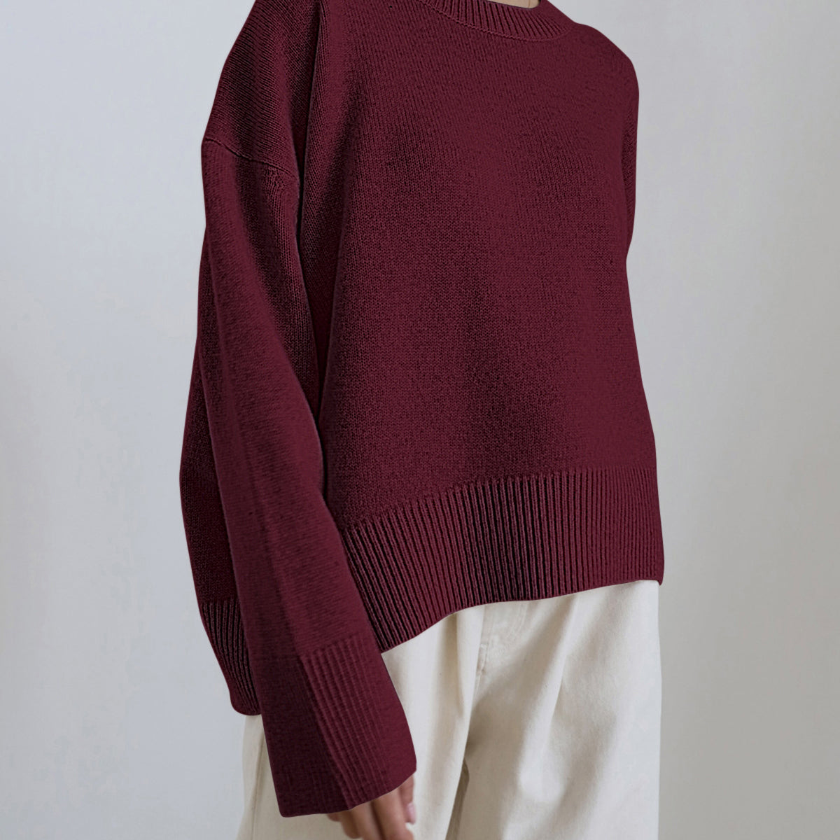 Pull oversize femme col rond à bords côtelés