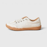 Baskets femme pieds larges en toile à lacets élastiques