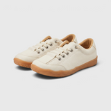 Baskets femme pieds larges en toile à lacets élastiques