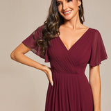 Robe midi portefeuille plissée à manches volantées