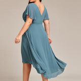 Robe midi portefeuille plissée à manches volantées