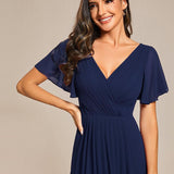 Robe midi portefeuille plissée à manches volantées