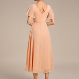 Robe midi portefeuille plissée à manches volantées