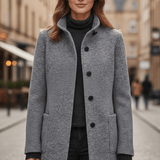 Manteau long en laine ajusté à col montant boutonné