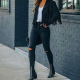Veste courte en suédine à franges et col cranté