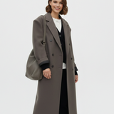 Lang Elegant Uldfrakke Minimalistisk Stil Komfort og Varme