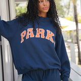 Sweat oversize femme col montant imprimé varsity