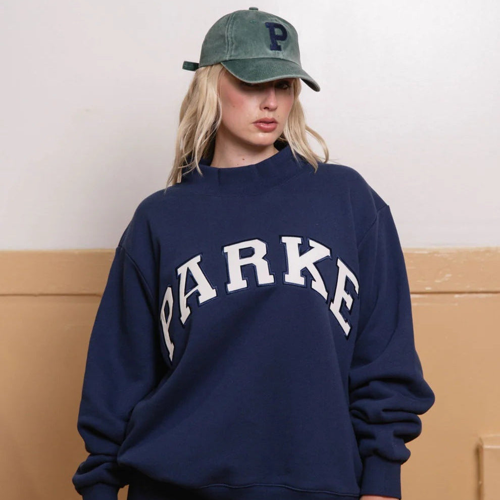 Sweat oversize femme col montant imprimé varsity