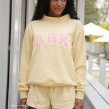 Sweat oversize femme col montant imprimé varsity