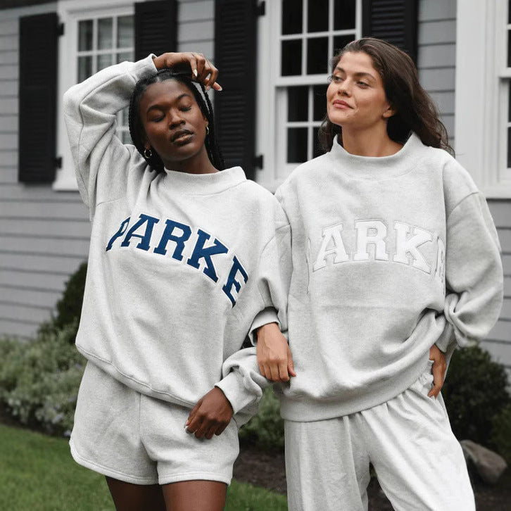 Sweat oversize femme col montant imprimé varsity