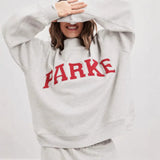 Sweat oversize femme col montant imprimé varsity