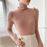 Pull femme col roulé en maille côtelée manches longues