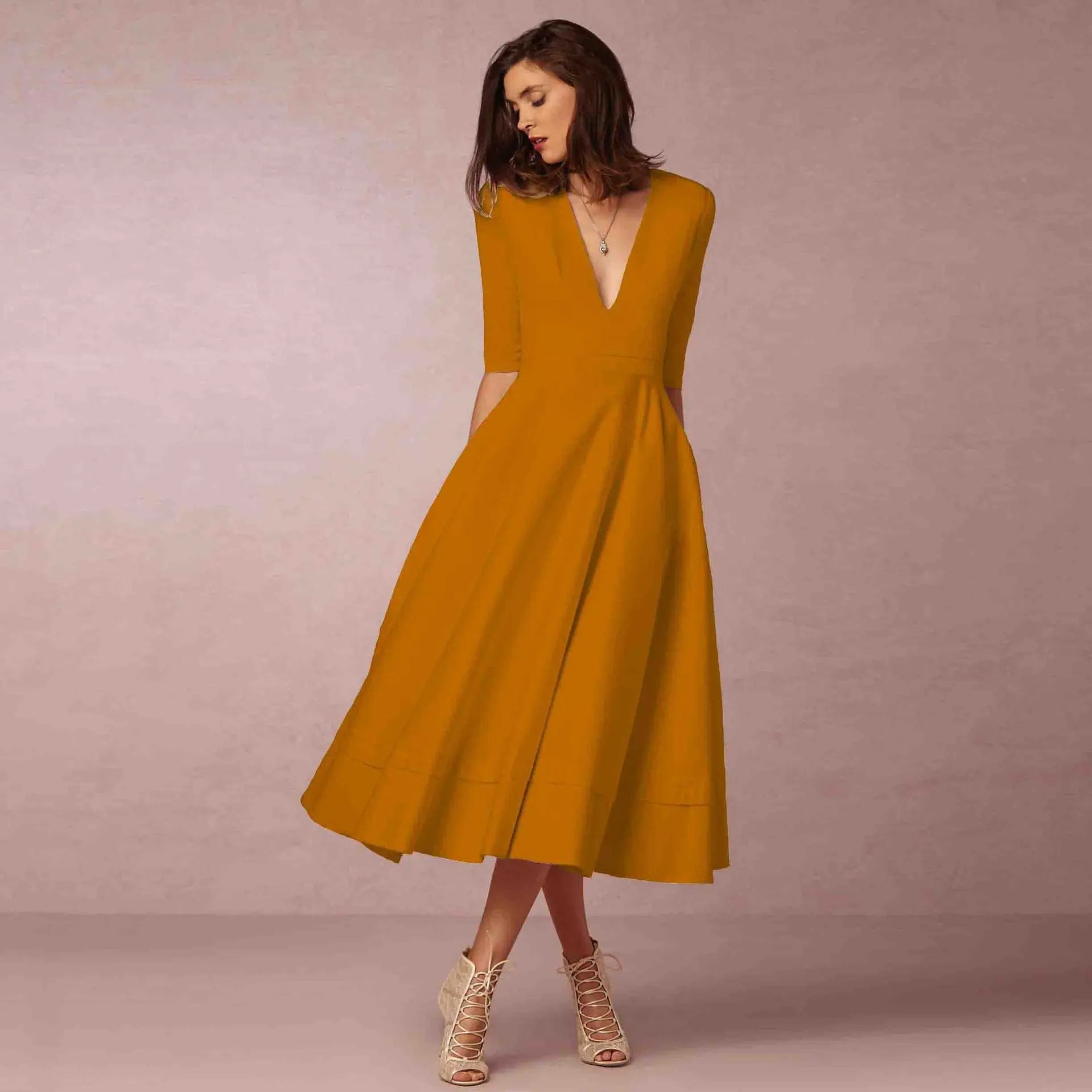 Robe Midi Évasée Décolleté V Sans Manches Élégance