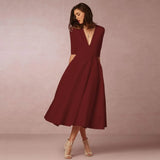 Robe Midi Évasée Décolleté V Sans Manches Élégance