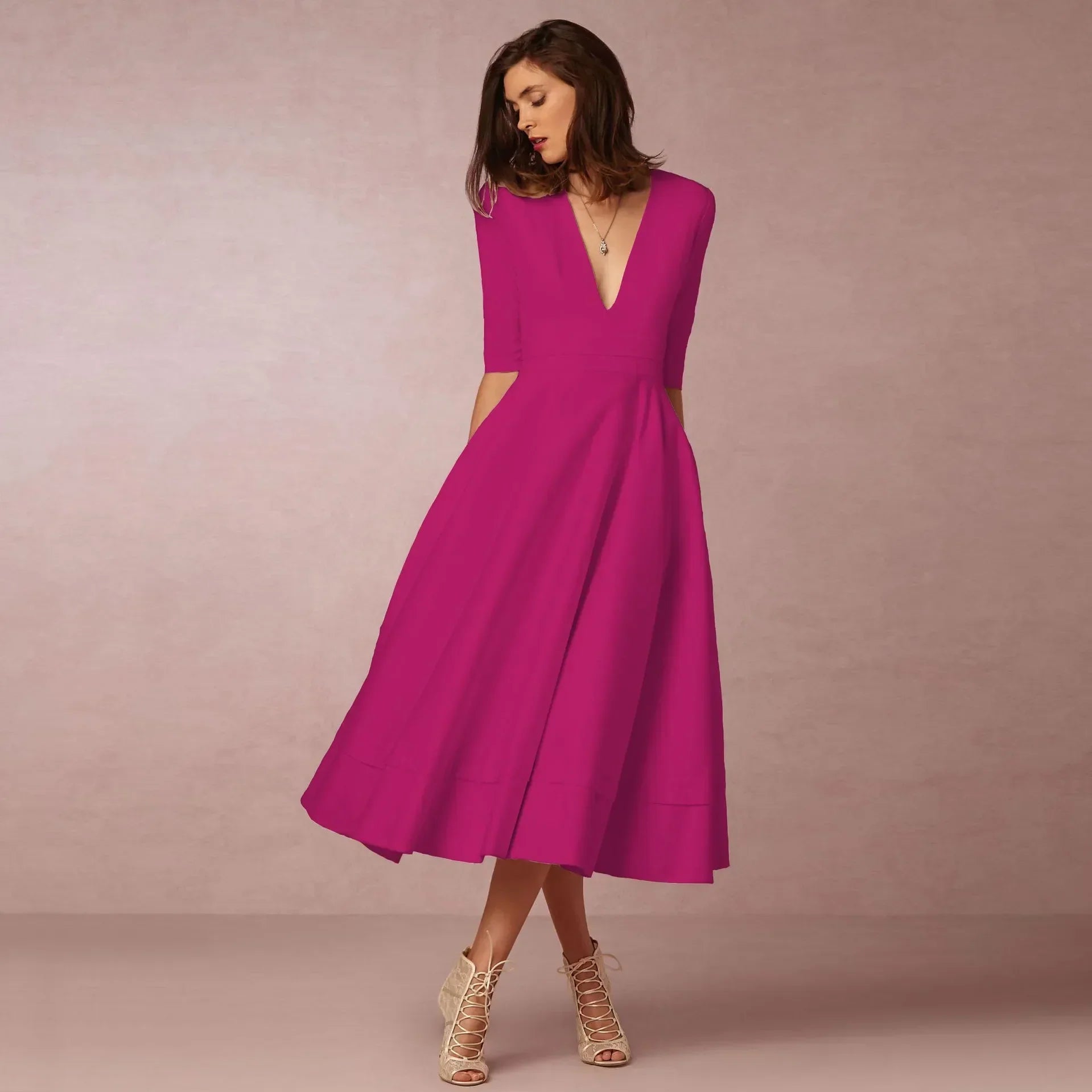 Robe Midi Évasée Décolleté V Sans Manches Élégance
