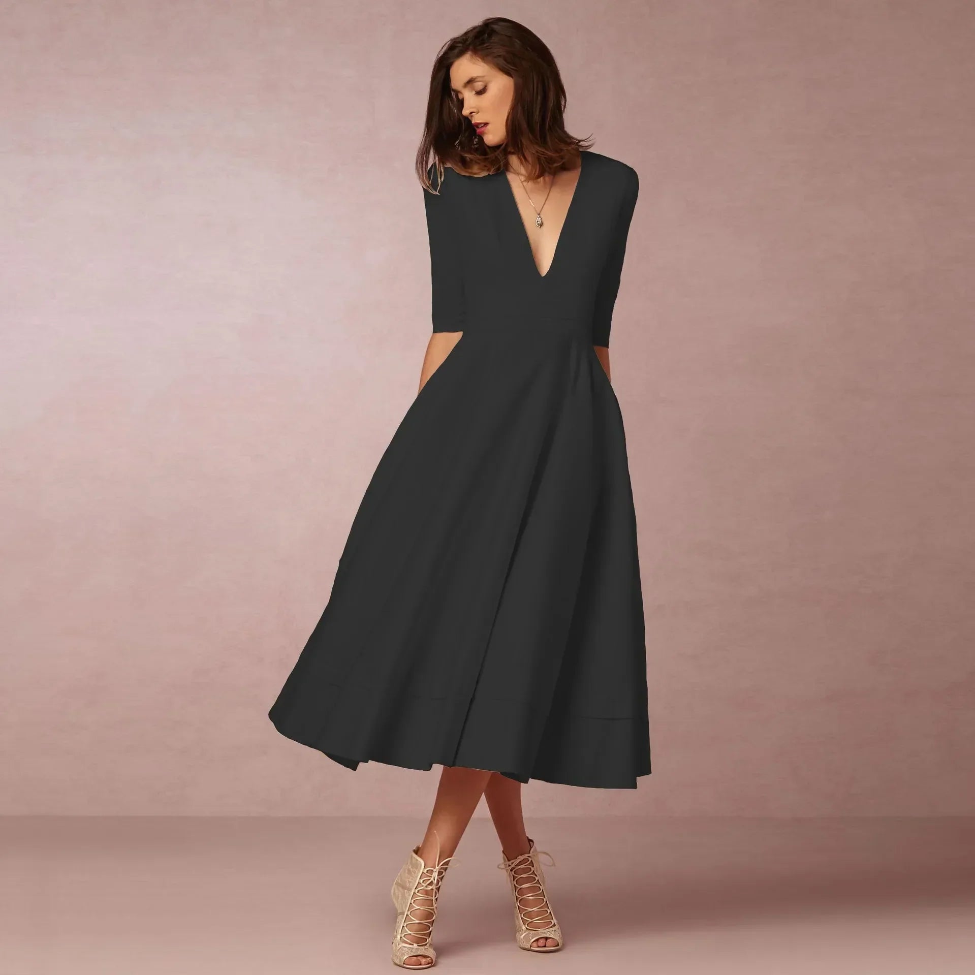 Robe Midi Évasée Décolleté V Sans Manches Élégance