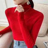 Pull femme col roulé en maille côtelée manches longues