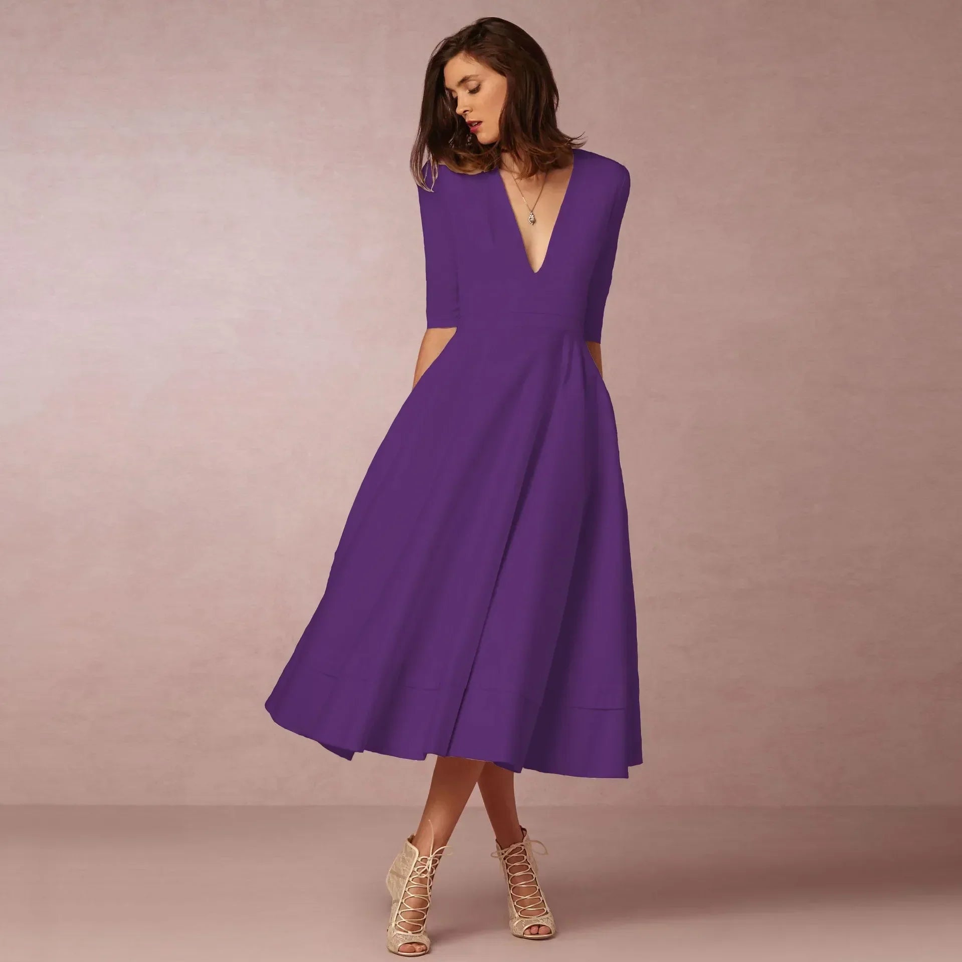 Robe Midi Évasée Décolleté V Sans Manches Élégance