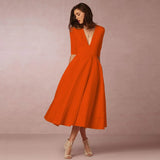 Robe Midi Évasée Décolleté V Sans Manches Élégance