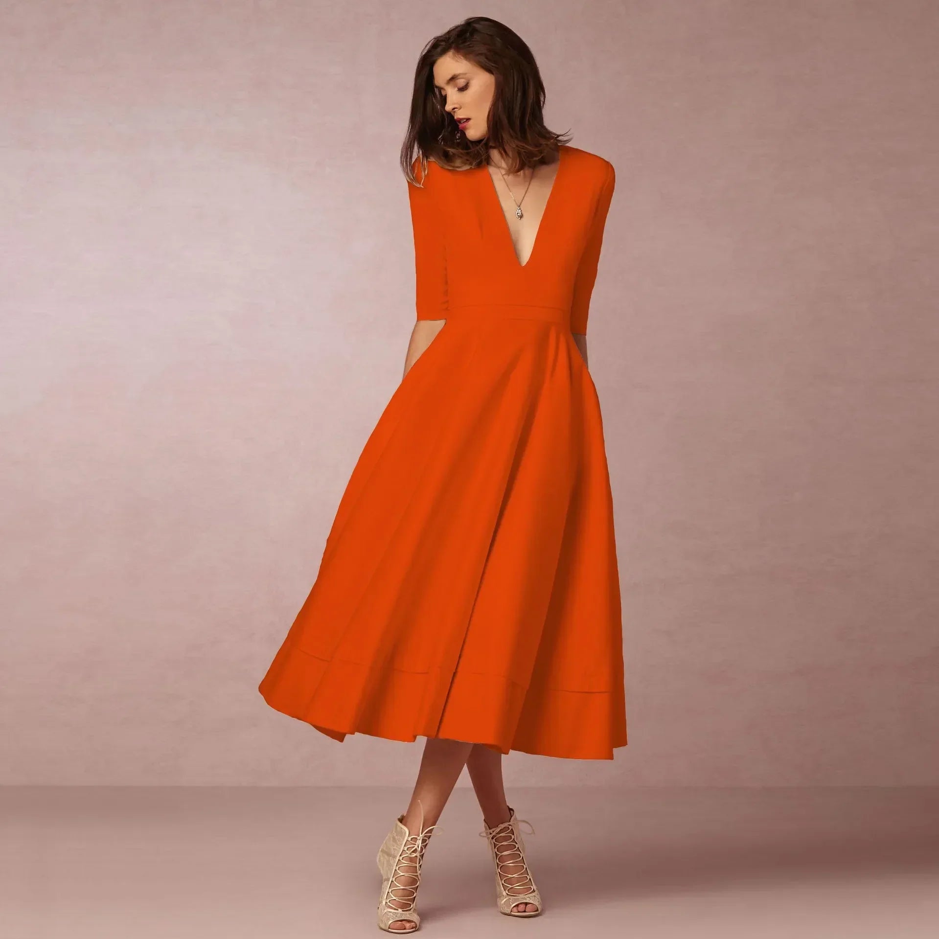 Robe Midi Évasée Décolleté V Sans Manches Élégance