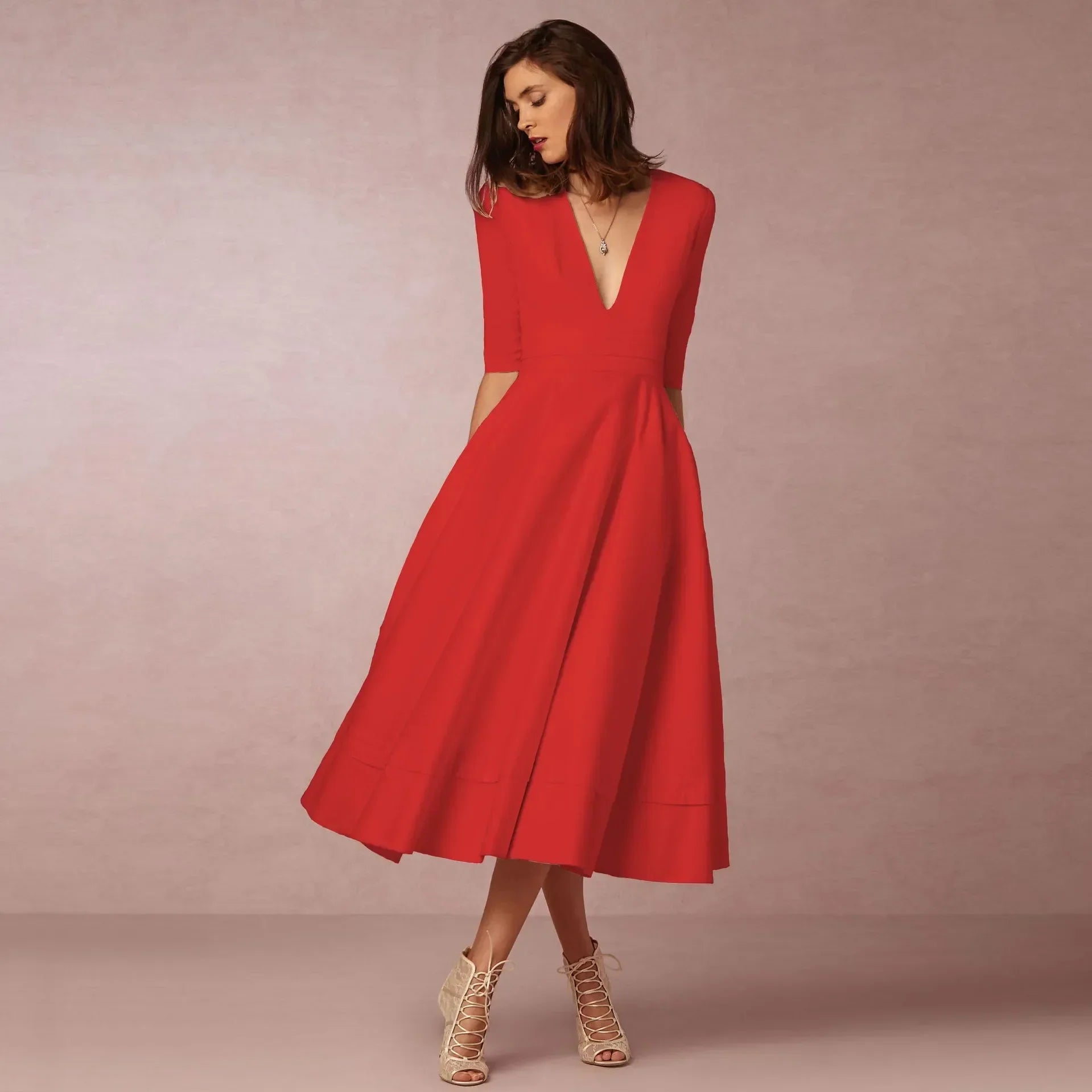 Robe Midi Évasée Décolleté V Sans Manches Élégance