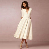 Robe Midi Évasée Décolleté V Sans Manches Élégance