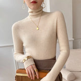 Pull femme col roulé en maille côtelée manches longues