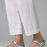 Mules plates femme en tressé à bride